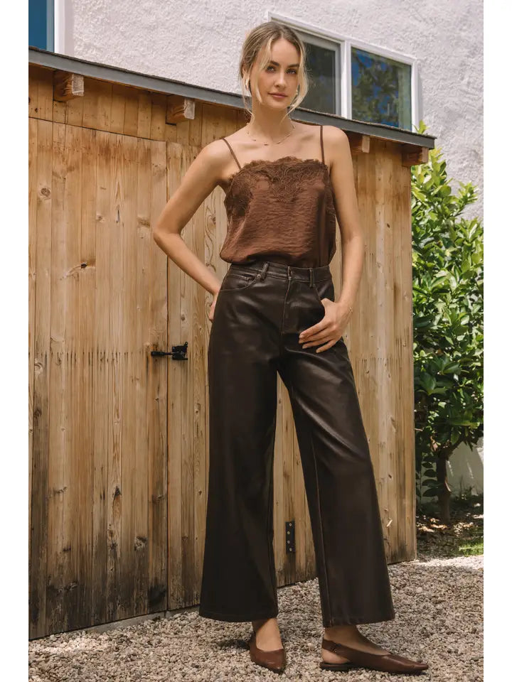 distressed faux leather pants